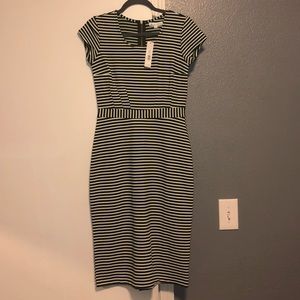 Green/White midi dress with cap sleeve. Size S